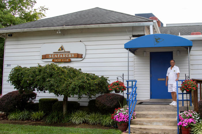 Commodore Benny McCottry stands outside the entrance of the Seafarers Yacht Club of Annapolis in Annapolis, Md. It was founded more than 60 years ago by a handful of Black boaters.