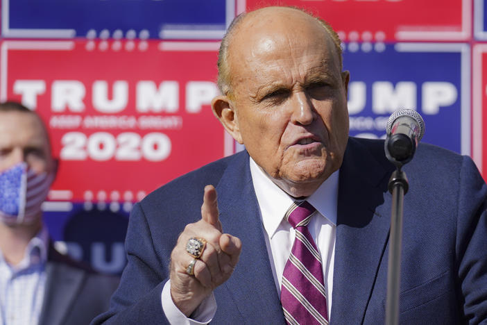 Former New York mayor Rudy Giuliani, a lawyer for President Donald Trump, speaks during a news conference at Four Seasons Total Landscaping on legal challenges to vote counting in Pennsylvania, Nov. 7, 2020, in Philadelphia.