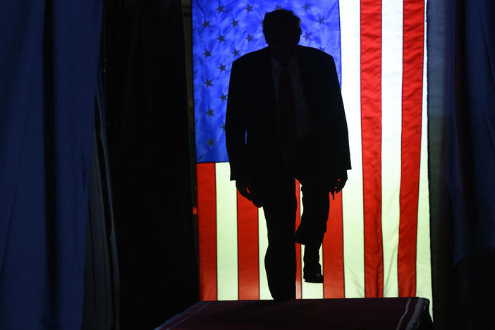 Donald Trump enters a political rally in Erie, Pa., in late July.