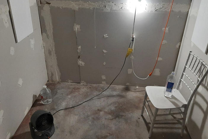 This undated photo provided by the Federal Bureau of Investigation's Portland Field Office shows the interior of a makeshift cinderblock cell in Klamath Falls, Ore., allegedly used as a prison cell from which a woman eventually escaped and found help.