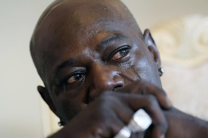 Aaron Bowman cries during an interview at his attorney's office in Monroe, La., on Aug. 5, 2021, as he discusses his injuries resulting from a Louisiana State trooper pummeling him during a traffic stop in 2019.