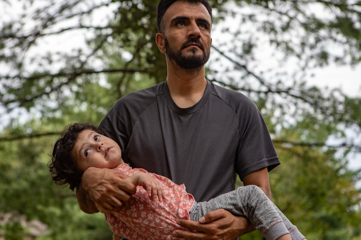 Shafi Amani and his daughter, Yousra, 3, in Alexandria, Va., on Aug. 3, 2023.