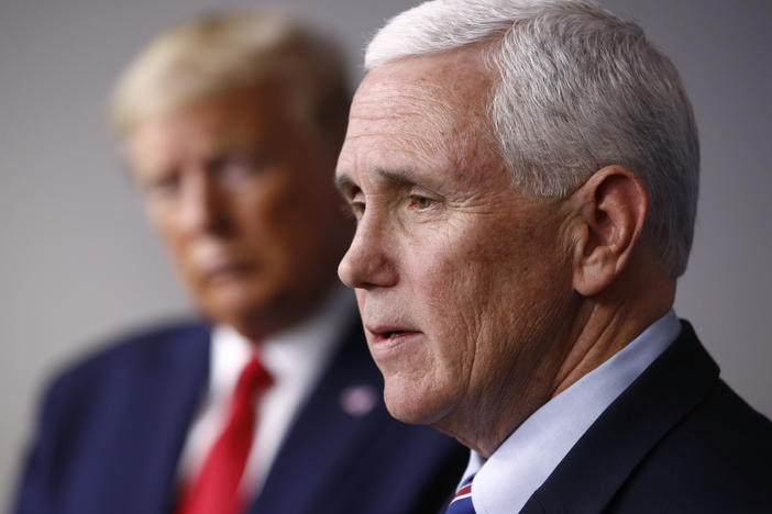 Vice President Mike Pence speaks alongside President Donald Trump in 2020. As Trump was being arraigned in Washington on yet another round of criminal charges this week, his former runningmate-turned-rival Mike Pence unveiled merchandise that quotes "Too Honest," a reference to Trump's response when Pence rebuffed his efforts to overturn the results of the 2020 election.