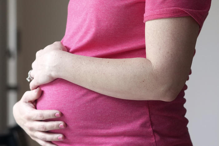 A pregnant woman stands for a portrait in Dallas on May 18. U.S. health officials have approved the first pill specifically intended to treat severe depression after childbirth, a condition that affects thousands of new mothers in the U.S. each year.