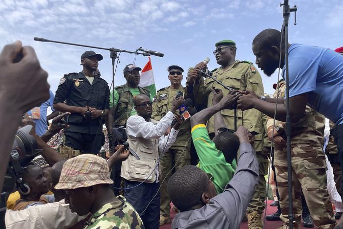 Mohamed Toumba, one of the soldiers who ousted Nigerian President Mohamed Bazoum, addresses supporters of Niger's ruling junta in Niamey, Niger, Sunday, Aug. 6, 2023.