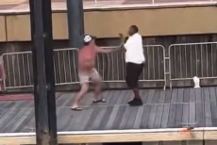 A screenshot from one of the videos of the brawl in Montgomery, Ala., on Saturday. The video shows a fight that broke out between an apparent dock worker and several men who appeared to be parking their pontoon boat in a space reserved for the city's riverboat.
