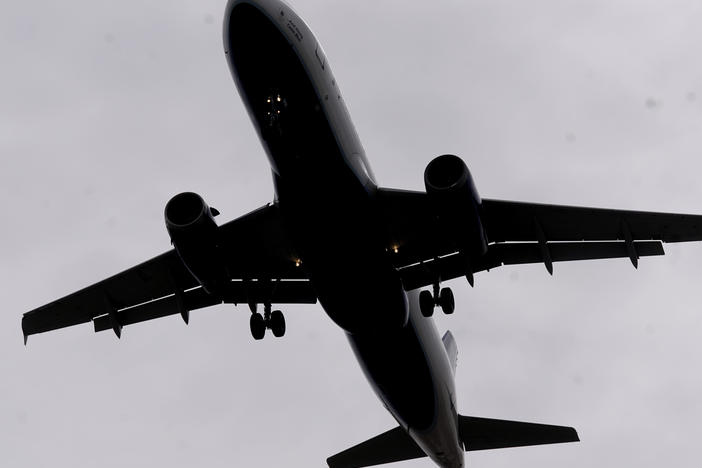 A plane arrives at Salt Lake City International Airport, in Salt Lake City on March 9, 2021. Federal officials say they're asking the FBI to consider criminal prosecution of nearly two dozen more airline passengers accused of disturbances on flights. The Federal Aviation Administration said Tuesday, Aug. 8, 2023 that it has now referred more than 270 cases to the FBI since late 2021.