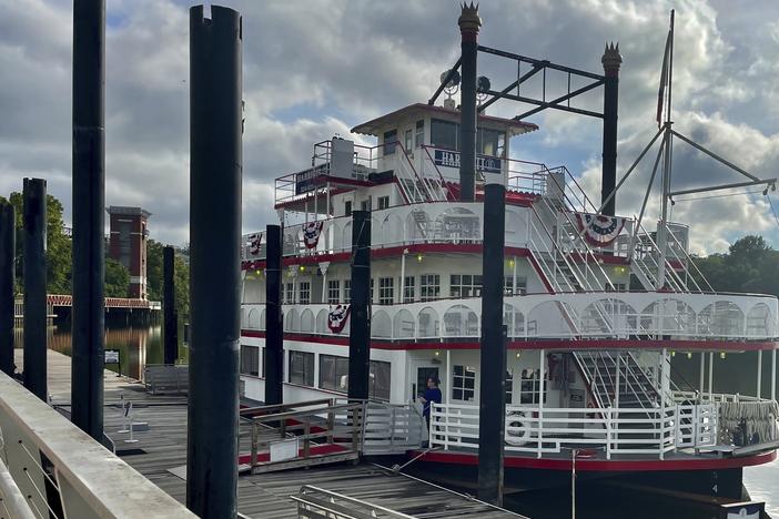 The Harriott II riverboat sits at the Riverfront dock in Montgomery, Ala. Three white men have been charged with assault for attacking the ship's co-captain last Saturday, which turned into a brawl along racial lines, as seen in dozens of videos online.
