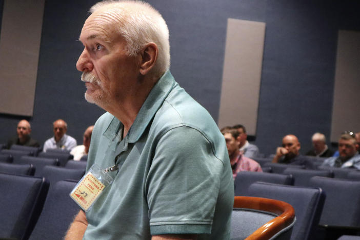 Retired West Virginia coal miner Terry Lilly, who has black lung, speaks during a public hearing hosted by the federal Mine Safety and Health Administration about its draft rule to limit worker exposure on Thursday.