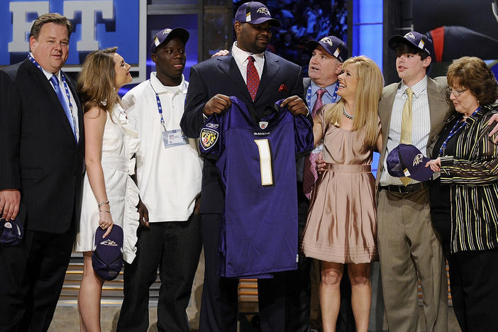 Members of the Tuohy family are speaking out after former NFL player Michael Oher alleged that they earned millions from pushing a false narrative that they adopted him. Here, Oher poses for a photograph with the Tuohy family at Radio City Music Hall for the 2009 NFL Draft on April 25, 2009 in New York City.