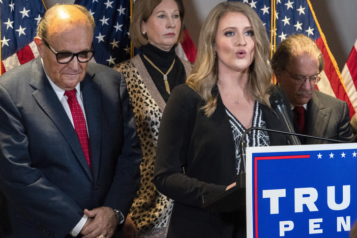Jenna Ellis, right, is seen with other members of former President Donald Trump's legal team, including Rudy Giuliani, left, and Sidney Powell, back, at a Republican National Committee news conference on Nov. 19, 2020.