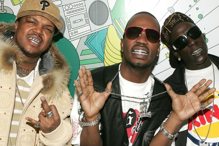 3 members of the Memphis hip-hop group Three 6 Mafia. D.J. Paul (from left), Juicy J and Crunchy Black at MTV's Total Request Live on March 22, 2006, in New York City.