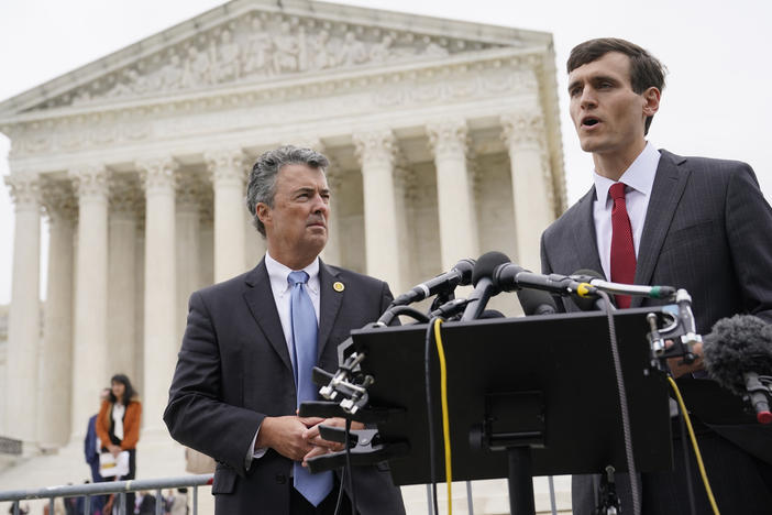 Alabama Solicitor General Edmund LaCour (right) speaks alongside Alabama Attorney General Steve Marshall after oral arguments in an Alabama congressional redistricting case outside the U.S. Supreme Court in Washington, D.C., in 2022.