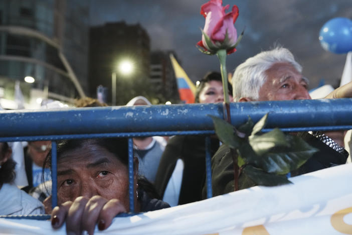 Supporters attend an open-air Mass during the closing campaign rally of the "Movement Construye" party in Quito, Ecuador, on Thursday.