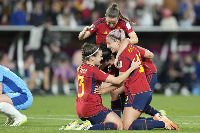 Spain teammates celebrate their victory over England in the final of the Women's World Cup at Stadium Australia in Sydney, Australia, on Sunday.