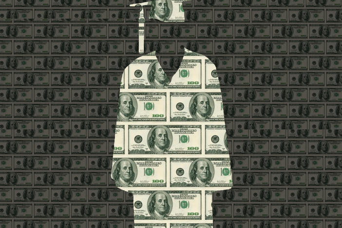 College graduation cap and gown made of $100 bill