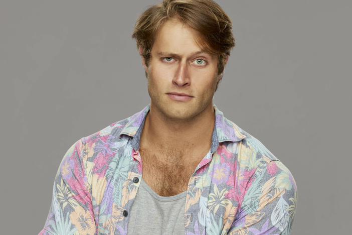 Luke Valentine was removed from CBS' Big Brother after using a racial slur in conversation.