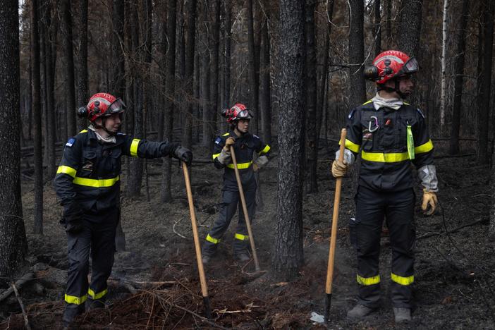 Canada is in the midst of an unprecedented wildfire season, intensified by climate change. Firefighters came from all over the world to help, like this team from France, on the fire line north of Chibugamau, Quebec, in June.