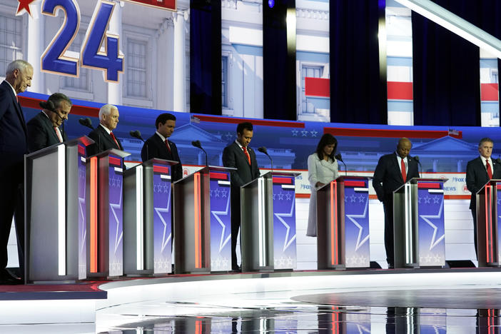 From left, former Arkansas Gov. Asa Hutchinson, former New Jersey Gov. Chris Christie, former Vice President Mike Pence, Florida Gov. Ron DeSantis, businessman Vivek Ramaswamy, former U.N. Ambassador Nikki Haley, Sen. Tim Scott, R-S.C., and North Dakota Gov. Doug Burgum before a Republican presidential primary debate hosted by Fox News Channel Wednesday in Milwaukee.