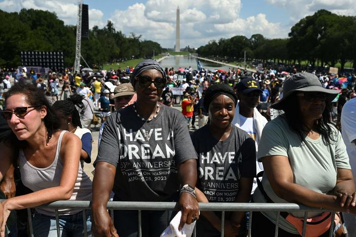 People participate in the 60th anniversary of the March on Washington at the Lincoln Memorial in Washington, D.C., on Saturday.