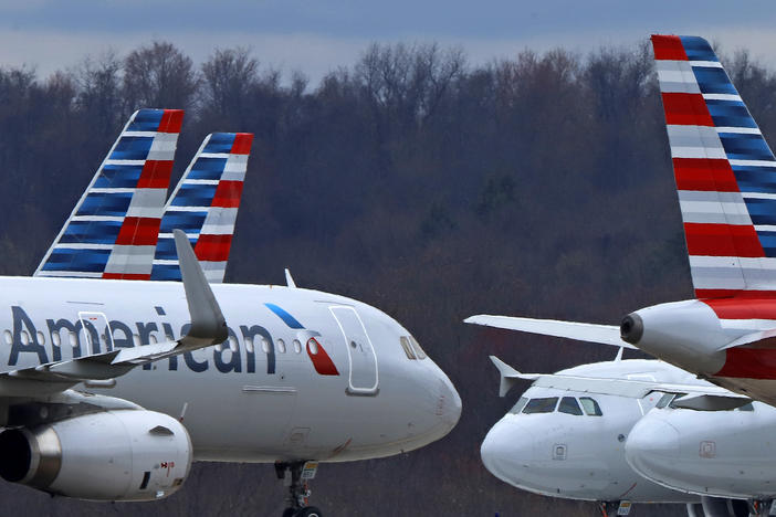 American Airlines planes are shown parked at Pittsburgh International Airport on March 31, 2020, in Imperial, Pa.
