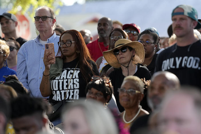 Residents of the Jacksonville community attend a prayer vigil for the victims of Saturday's mass shooting Sunday, Aug. 27, 2023, in Jacksonville, Fla.