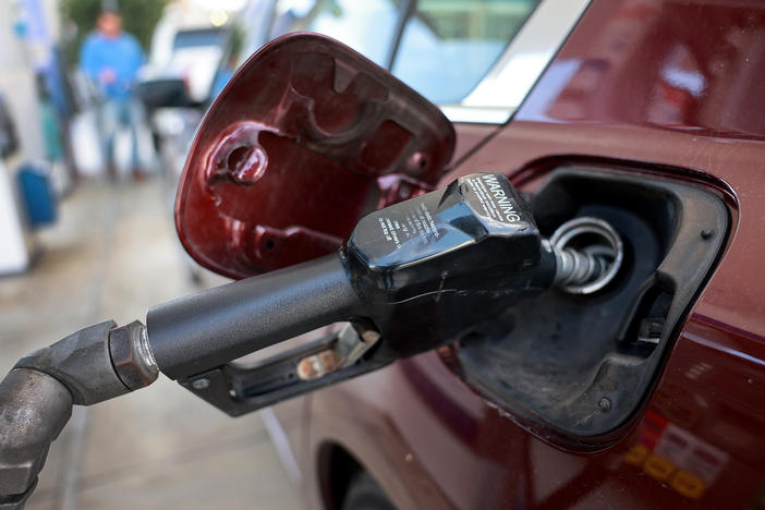 Gas is pumped into a vehicle at a gas station in Miami, Florida in January. Officials are warning of a "potentially widespread" fuel contamination in the state, which could hamper evacuations from Tropical Storm Idalia.