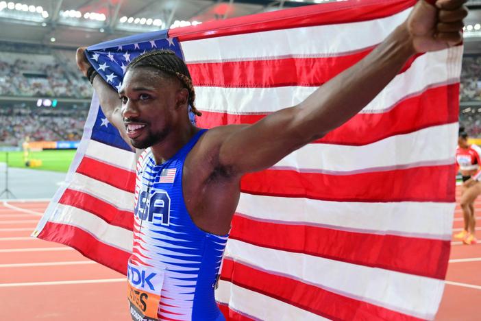 Noah Lyles celebrates after anchoring the USA team to victory in the men's 4x100m relay final during the World Athletics Championships at the National Athletics Centre in Budapest on August 26.