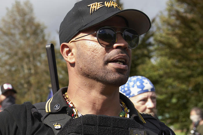 Proud Boys leader Enrique Tarrio speaks at a rally in Delta Park on Sept. 26, 2020, in Portland, Ore.
