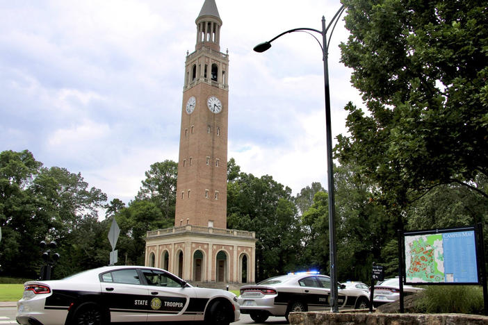 Law enforcement respond to the University of North Carolina at Chapel Hill campus on Monday after the university locked down and warned of an armed person on campus.