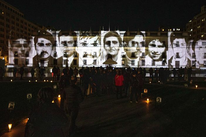 A view of the images portraying victims of the Augusto Pinochet dictatorship projected onto the La Moneda Presidential Palace to mark the commemoration of the International Day of the Disappeared in Santiago, Chile, on Wednesday.