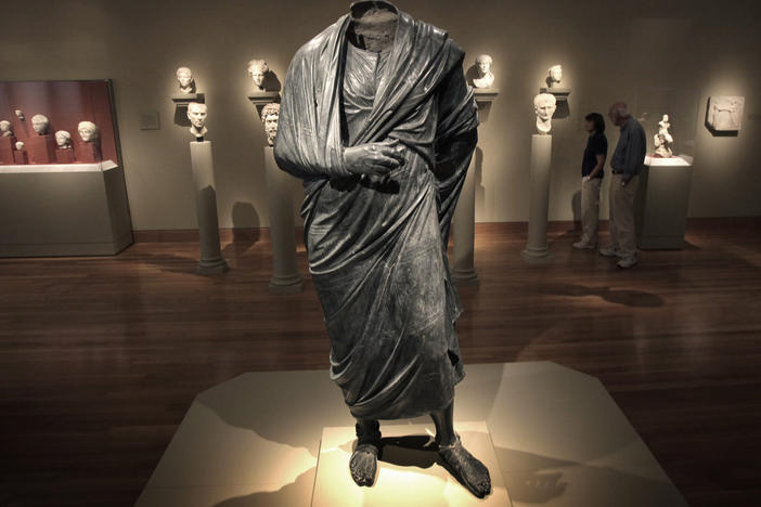 A Roman-era statue, thought to represent Marcus Aurelius, stands in a gallery at the Cleveland Museum of Art on June 25, 2010.