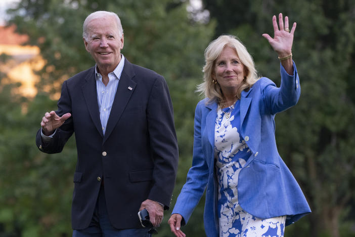 President Joe Biden and first lady Jill Biden wave as they arrive at the White House, Saturday, Aug. 26, 2023, in Washington after a vacation in Lake Tahoe.