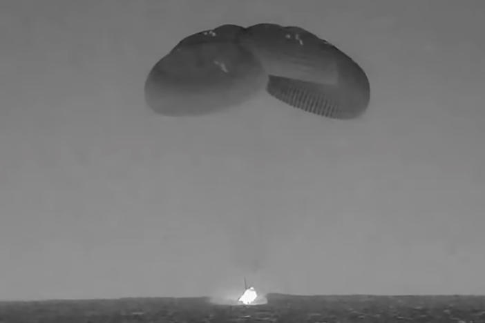 In this image from video made available by NASA, the SpaceX Crew Dragon, slowed by parachutes, splashes down in the Atlantic Ocean off the Florida coast, Monday, Sept. 4, 2023, as it returns to Earth with NASA astronauts Stephen Bowen and Woody Hoburg, United Arab Emirates astronaut Sultan AlNeyadi and Roscosmos cosmonaut Andrey Fedyaev after a six-month stay at the International Space Station.