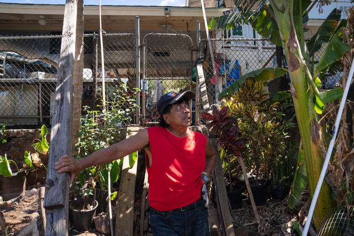 Danilo Andres, 60, outside his home in Lahaina. The fire jumped his home and a surrounding cluster.