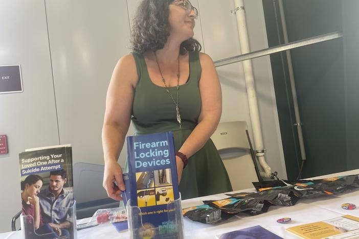 Jess Hegstrom, a public health worker for Lewis and Clark County in Montana, tries to start conversations about suicide risk at gun shows. "I'm not here to waggle my finger at you," she says.