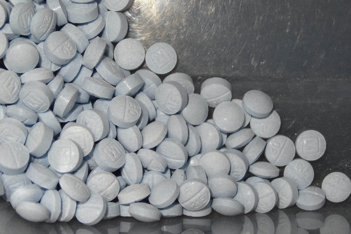 This photo provided by the U.S. Attorneys Office for Utah and introduced as evidence in a 2019 trial shows fentanyl-laced fake oxycodone pills collected during an investigation.