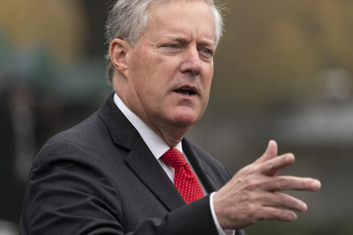 White House chief of staff Mark Meadows speaks with reporters at the White House, Oct. 21, 2020, in Washington. He is one of 19 defendants in a Georgia racketeering case involving former President Donald Trump.