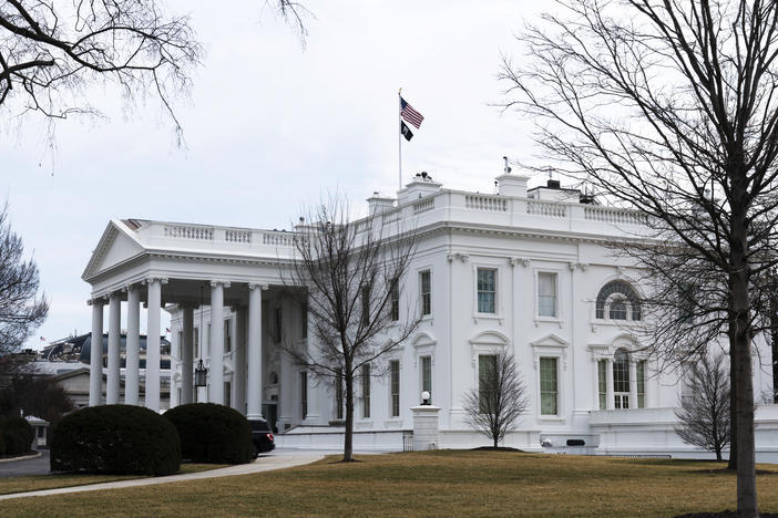 An American flag flies on top of the White House, Feb. 12, 2022, in Washington. A federal appeals court Friday, Sept. 8, 2023, significantly whittled down a lower court's order curbing Biden administration communications with social media companies over controversial content about COVID-19 and other issues.