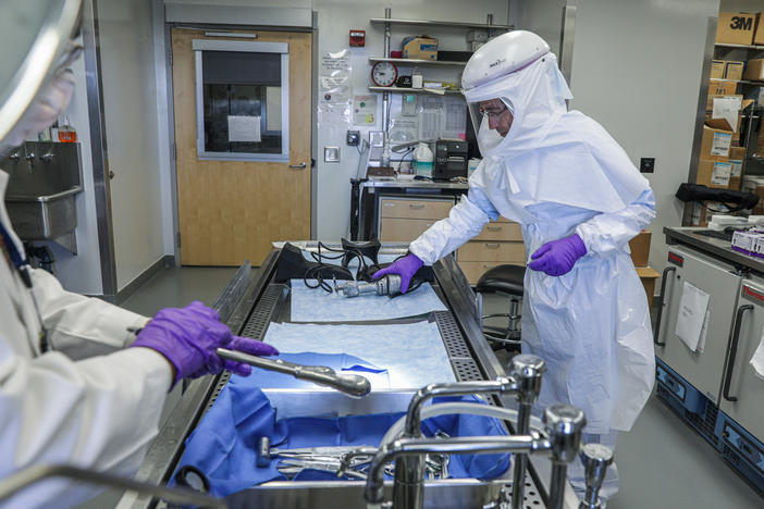 Researchers looking for root causes of long COVID work in the autopsy suite inside the Clinical Center at the National Institute of Health in Bethesda, Maryland.