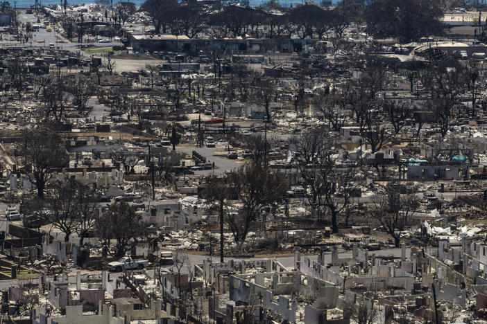 Charred remains of homes are visible following a wildfire in Lahaina, Hawaii, Aug. 22, 2023.
