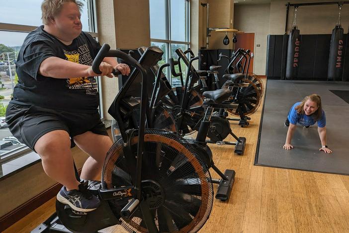 Jason Silverman, on the exercise bike, and his friend Melissa Mills go to the gym together when they hang out. The pair are part of the Friendship Project in Framingham, Massachusetts.