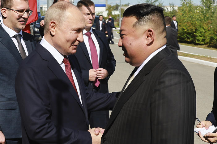 Russian President Vladimir Putin, left, and North Korea's leader Kim Jong Un shake hands during their meeting at the Vostochny cosmodrome outside the city of Tsiolkovsky, about 200 kilometers (125 miles) from the city of Blagoveshchensk in the far eastern Amur region, Russia, on Wednesday, Sept. 13, 2023.