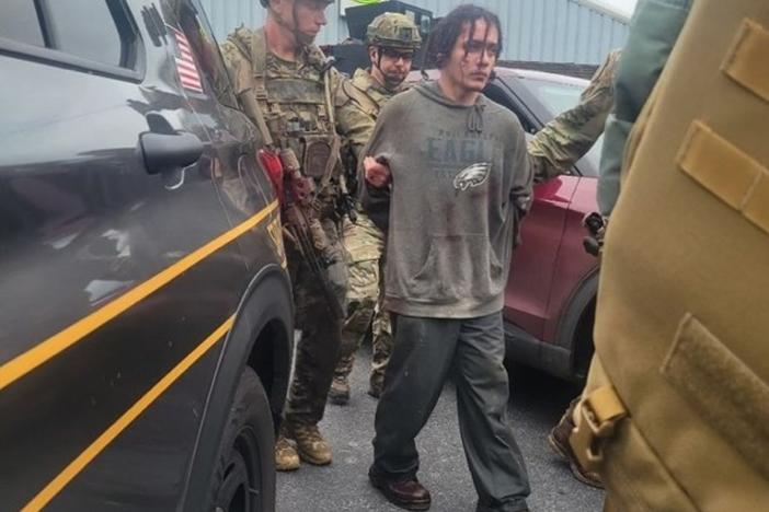 Convicted murderer Danelo Cavalcante was "subdued" by a police dog as he tried to crawl away from tactical teams — but by then, he was surrounded, officials said on Wednesday.
