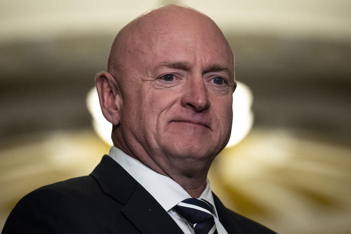Sen. Mark Kelly (D-AZ) waits to speak during a news conference following a closed-door lunch meeting with Senate Democrats at the U.S. Capitol March 22, 2023 in Washington, D.C.