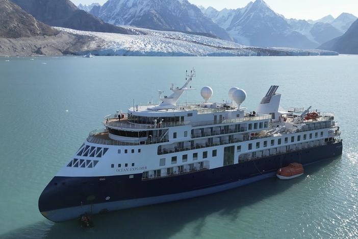 The Ocean Explorer, a Bahamas-flagged Norwegian cruise ship with 206 passengers and crew, which had run aground in northwestern Greenland, is pictured on Tuesday