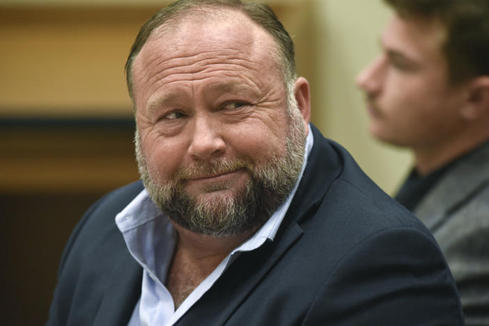 Infowars founder Alex Jones appears in court to testify during the Sandy Hook defamation damages trial at Connecticut Superior Court in Waterbury, Conn., on Sept. 22, 2022.