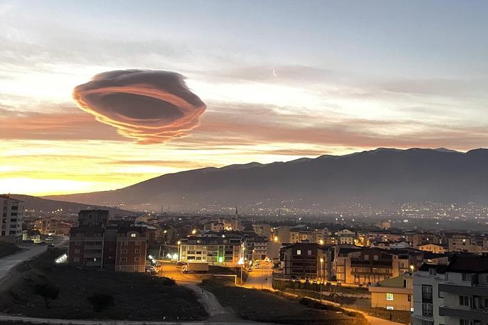 Saucer-like lenticular clouds appear over Turkiye's Bursa province in the early morning hours of January 19, 2023.