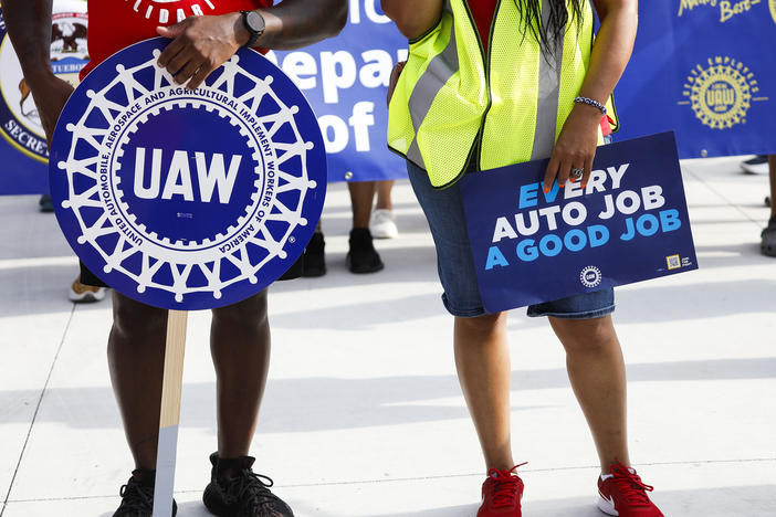 United Auto Workers members and others gather for a rally after marching in the Detroit Labor Day Parade in Detroit on Sept. 4, 2023. Only hours remain before UAW contracts with the Big 3 automakers expire just before midnight.