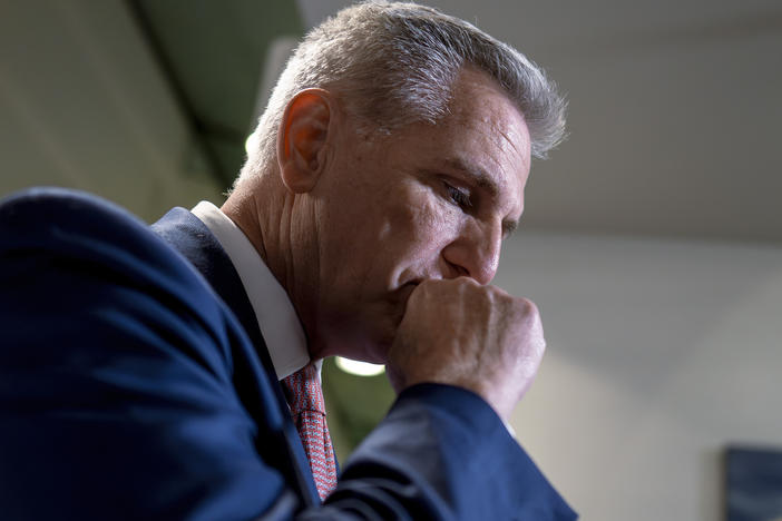 House Speaker Kevin McCarthy talks to reporters about launching an impeachment inquiry into President Biden on Sept. 14, 2023.